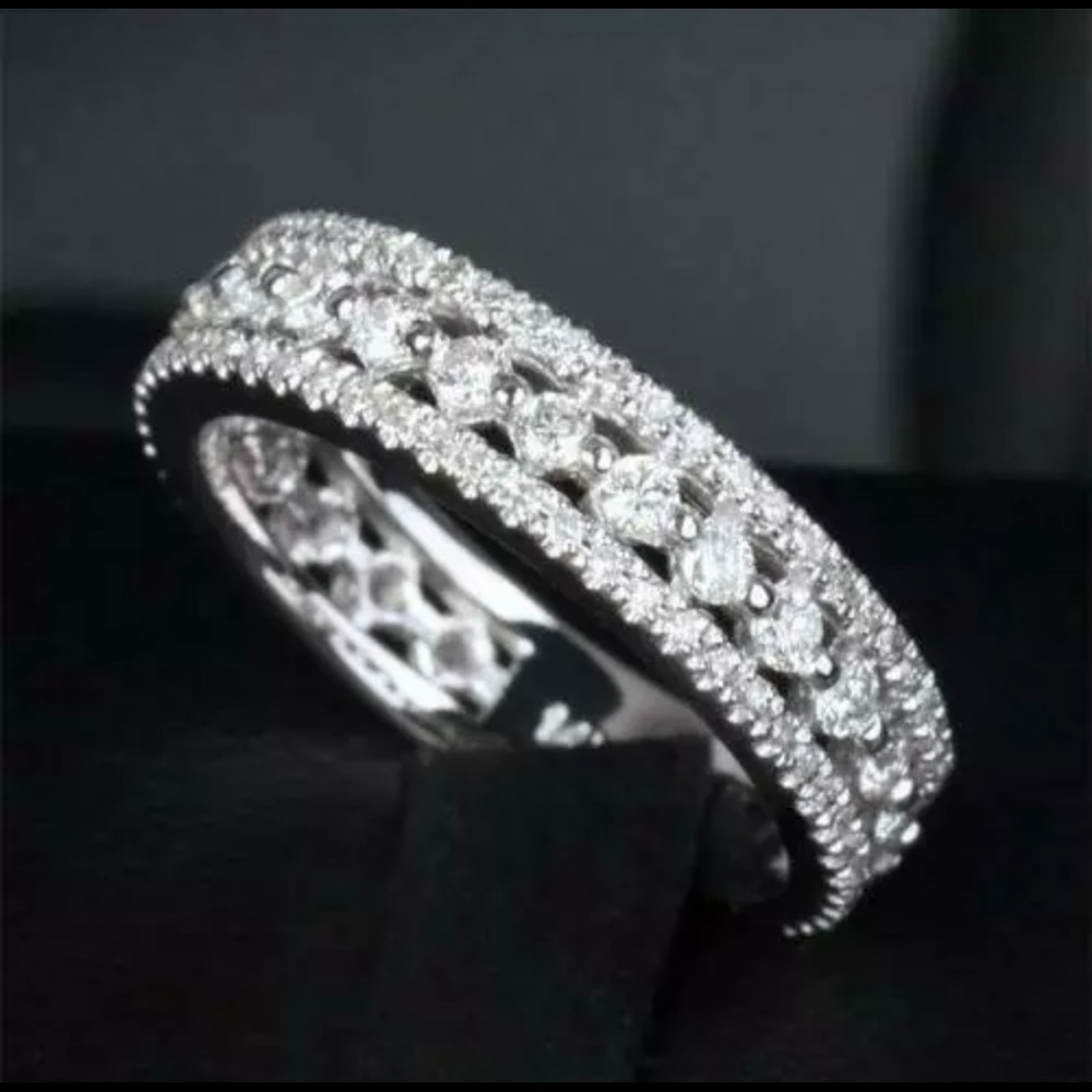 Moissanite wedding or anniversary band.